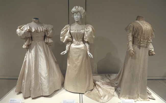 Exhibit features wedding gown fashions ...